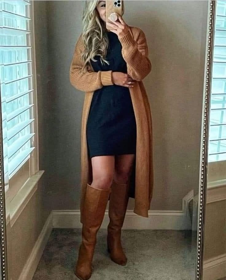 7. Long Camel Duster Cardigan Layered Over a Navy Sweater Dress