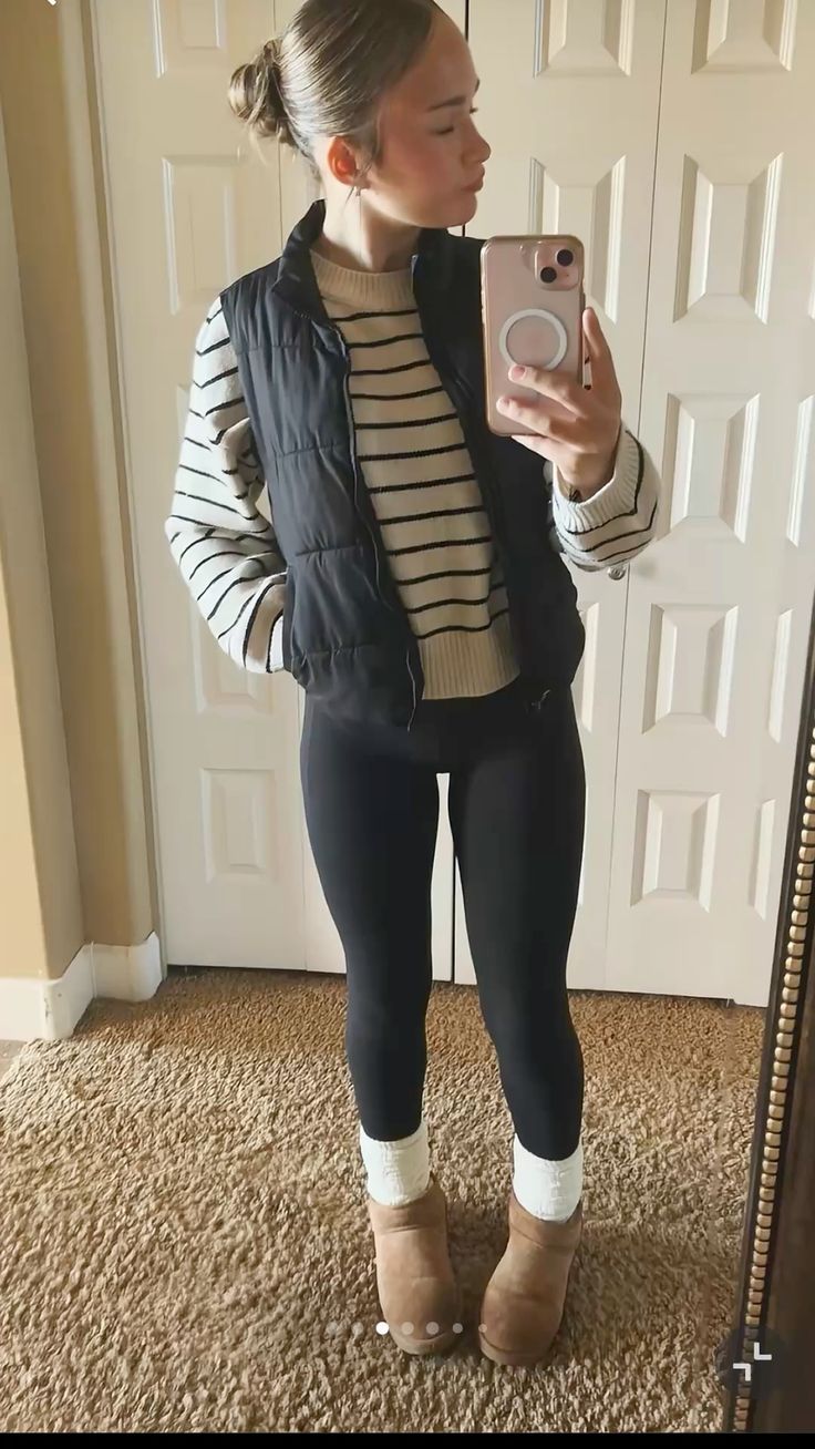 12. Cream Striped Sweater With Black Puffer Vest and Shearling Boots