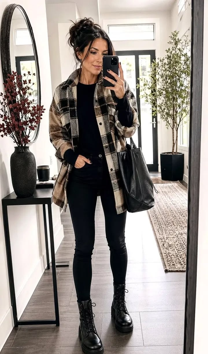 17. All-Black Base Under a Camel-and-Black Plaid Shacket With Lace-Up Boots