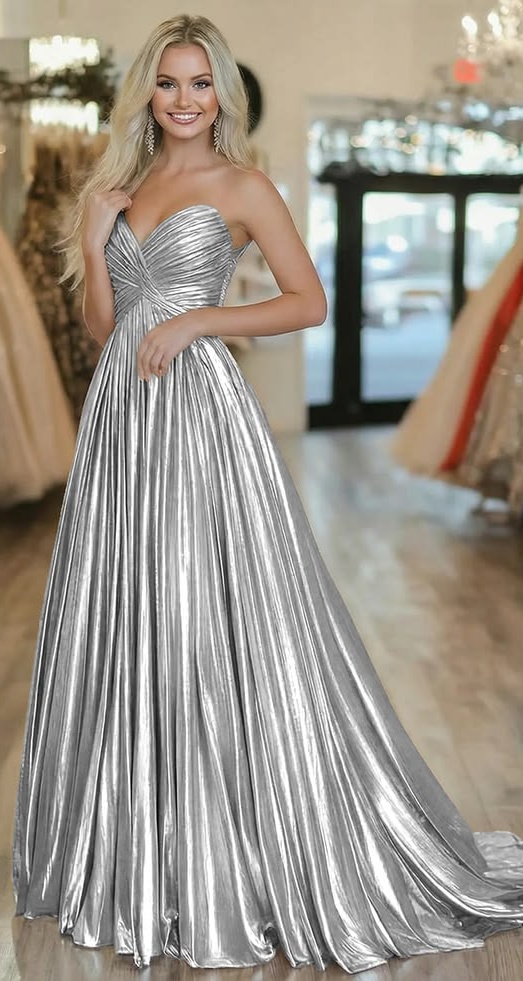 17. Pleated Silver Lamé Strapless Ball Gown With Twist Bust