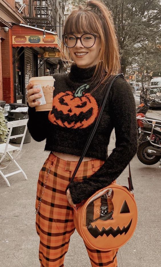 1. Jack-O’-Lantern Cropped Sweater With Orange Plaid Trousers