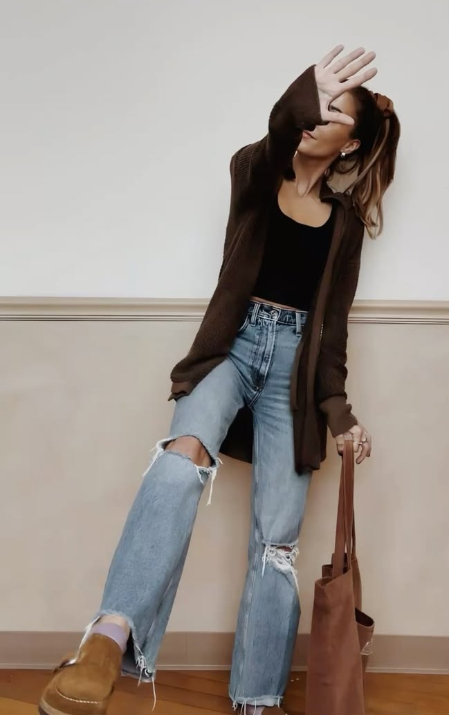 18. Open-Knit Chocolate Cardigan With Raw-Hem Jeans and Suede Clogs