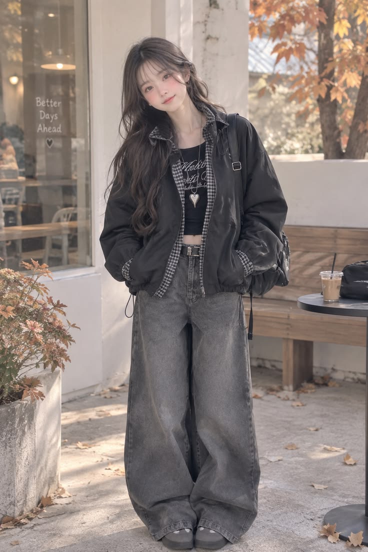 5. Black Bomber Jacket and Grey Baggy Jeans With a Crop Top
