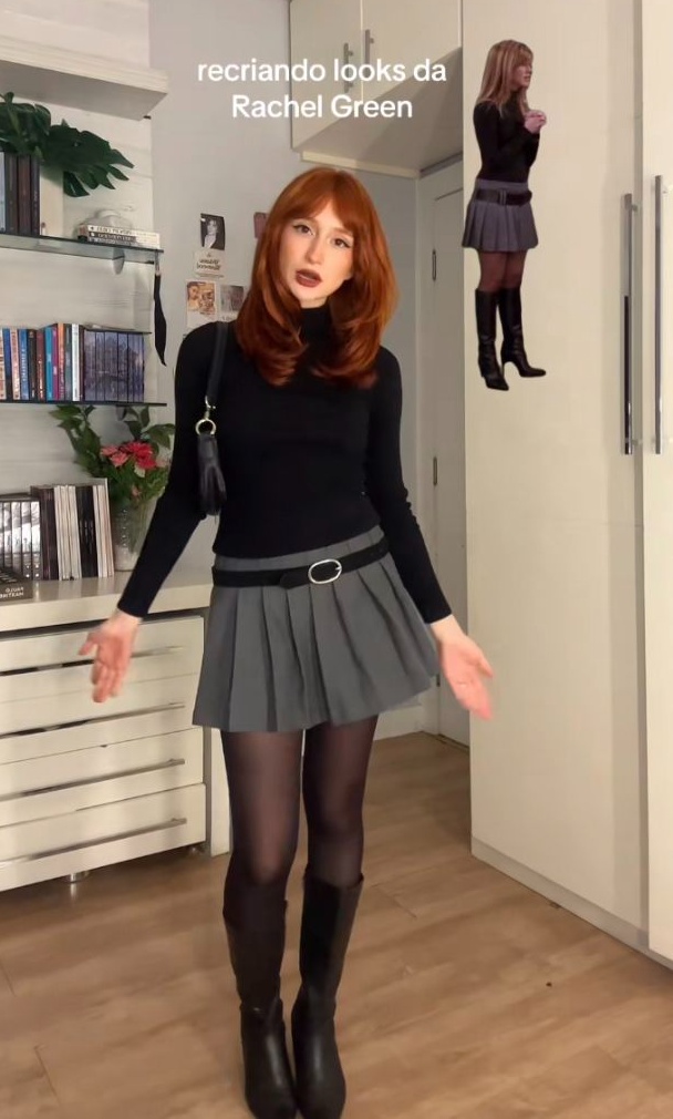 14. Flat Black Knee Boots With a Turtleneck and Belted Pleated Mini