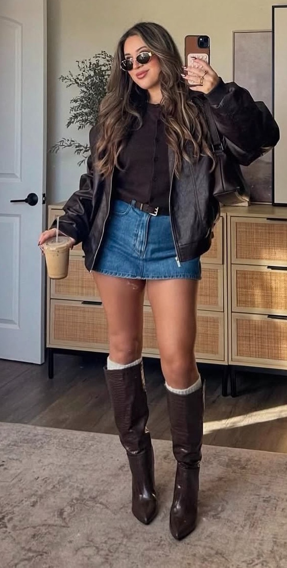 19. Oversized Leather Bomber With Denim Mini and Socks Over Croc Boots