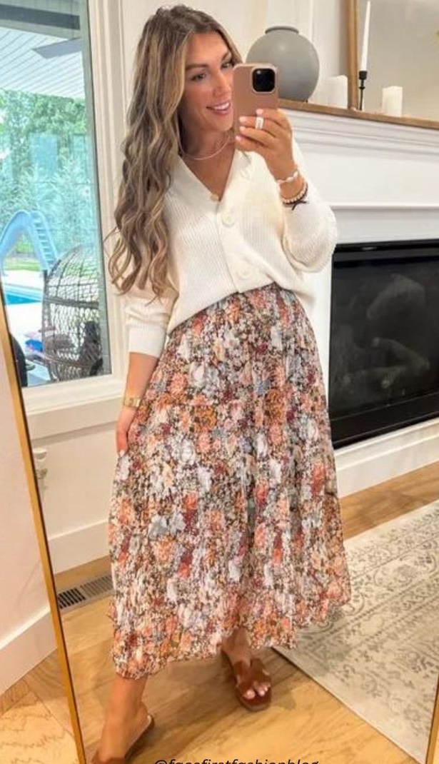 13. Cream Button Cardigan Tucked Into a Pleated Floral Midi Skirt