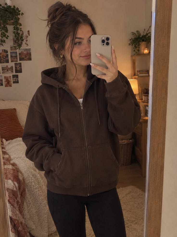 18. Washed Brown Zip-Up Hoodie Over a White Tank With Black Leggings