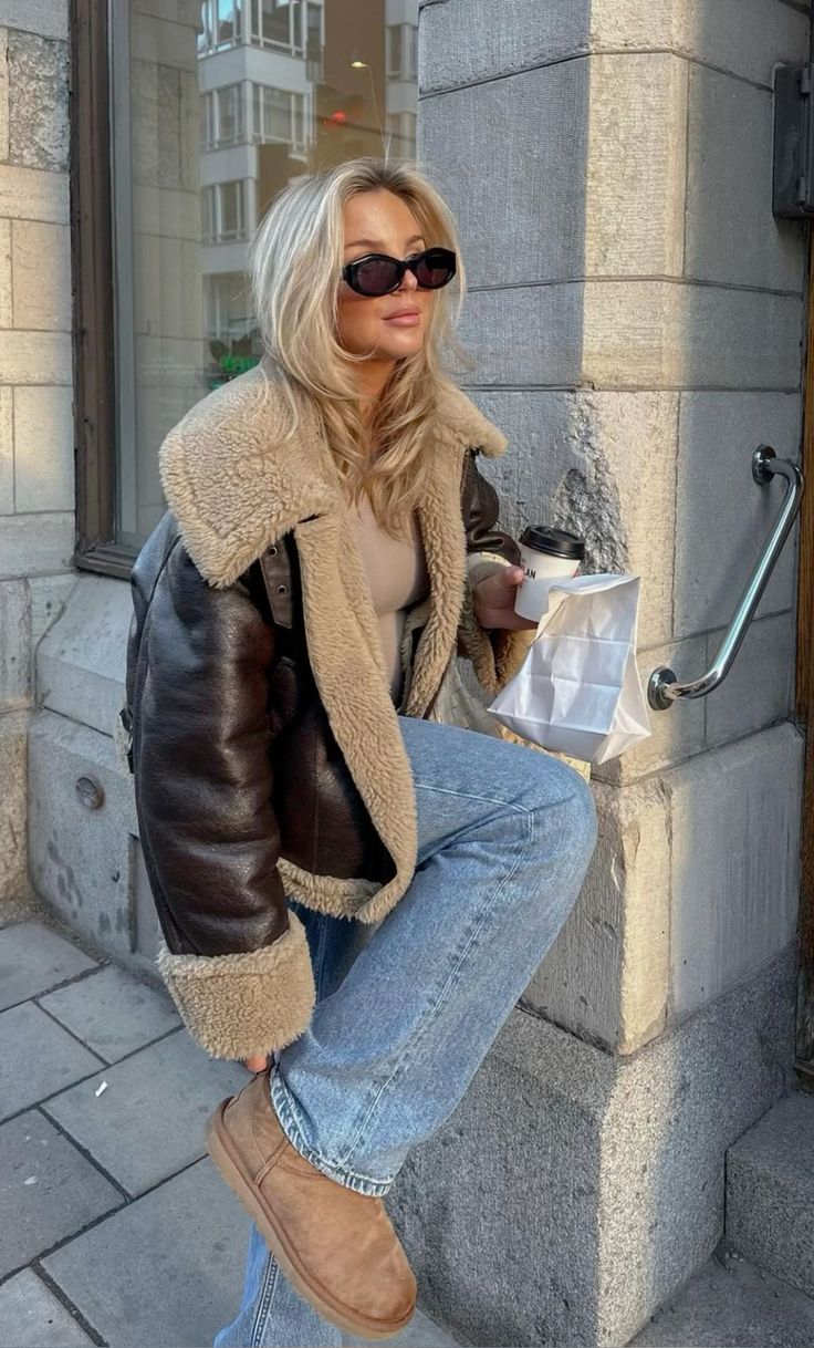 10. Shearling-Collar Aviator Jacket With Straight Jeans and Suede Boots