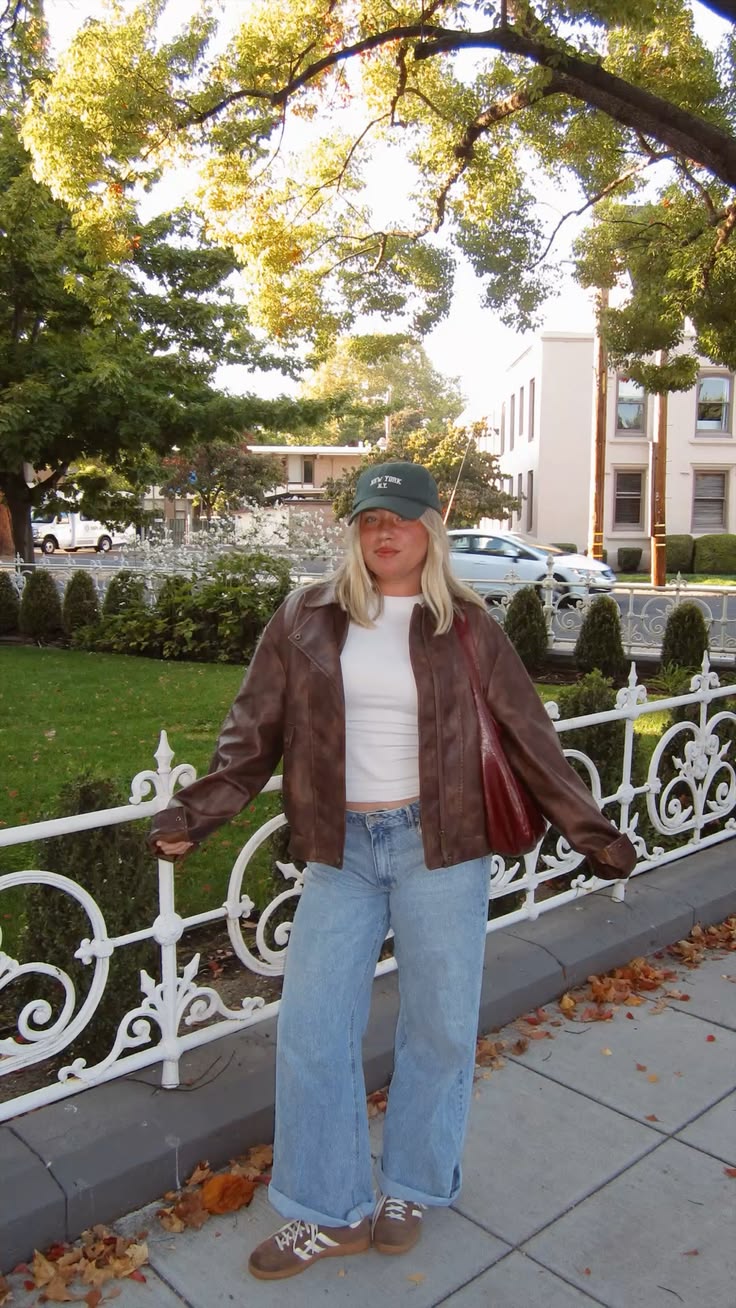 11. Vintage Brown Leather Jacket, Cuffed Baggy Jeans and Suede Sneakers